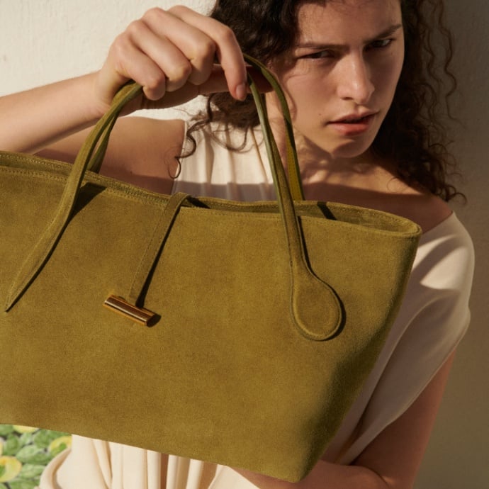 Image of model holding Liffner bag